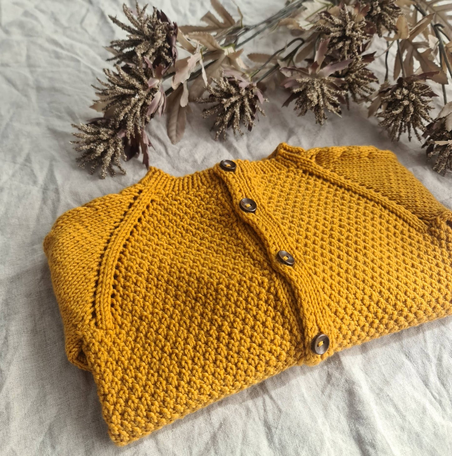 Mouk - Kinderjacke mit Zöpfen und Perlmuster